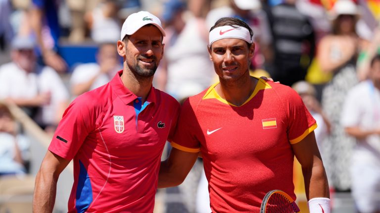 Spain's Rafael Nadal, right, and Serbia's Novak Djokovic pose before their men's singles second round match at the Roland Garros stadium at the 2024 Summer Olympics, Monday, July 29, 2024, in Paris, France. (Andy Wong/AP)