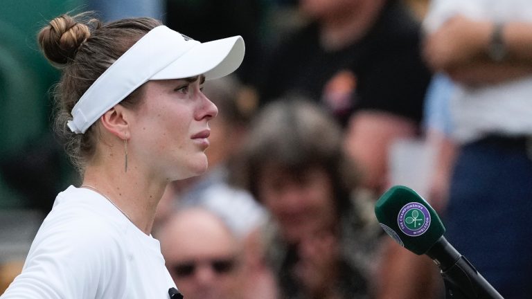 Elina Svitolina of Ukraine addresses the crowd after defeating Xinyu Wang of China in their fourth round match at the Wimbledon tennis championships in London, Monday, July 8, 2024. (Mosa'ab Elshamy/AP)