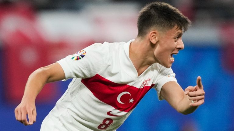 Turkey's Arda Guler yells to a teammate during a round of sixteen match between Austria and Turkey at the Euro 2024 soccer tournament. (Martin Meissner/AP)