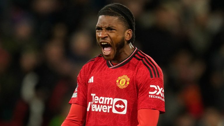 Willy Kambwala celebrates during an English Premier League match between Manchester United and Aston Villa, Dec. 26, 2023. (AP Photo/Dave Thompson)