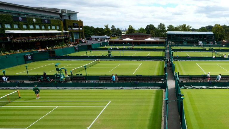 A view across courts as players train at the All England Lawn Tennis and Croquet Club in Wimbledon, London, June 28, 2024. (AP/Kirsty Wigglesworth)