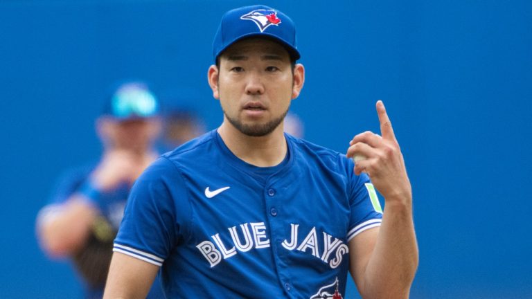 Toronto Blue Jays starting pitcher Yusei Kikuchi signals to catcher Danny Jansen during the first inning of a game against the Cleveland Guardians, June 23, 2024. (AP Photo/Phil Long)