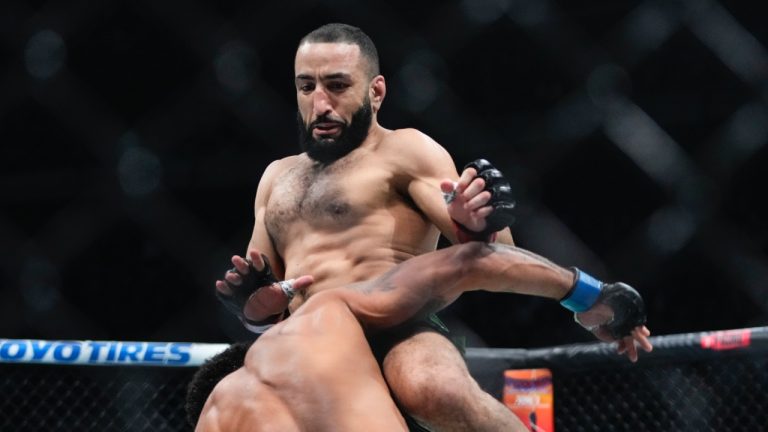 Belal Muhammad lands a knee on his opponent during a UFC welterweight bout. (Frank Franklin II/AP)