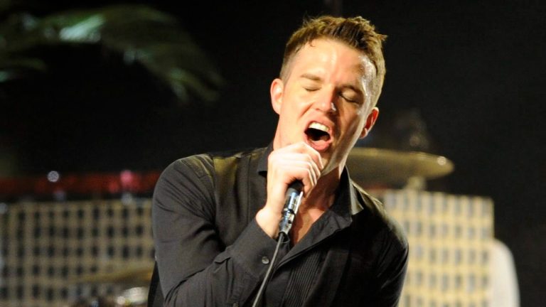  In this April 18, 2009 file photo, Brandon Flowers of The Killers performs during the band's headlining set on the second day of the Coachella Valley Music & Arts Festival in Indio, Calif. (AP Photo)