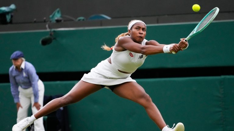 Coco Gauff of the United States plays a backhand return to Sonay Kartal of Britain during their third round match at the Wimbledon tennis championships in London, Friday, July 5, 2024. (Kirsty Wigglesworth/AP)