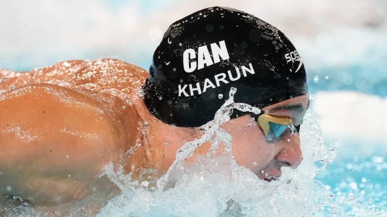 Ilya Kharun, of Canada, competes during a heat in the men's 200-metre butterfly at the 2024 Summer Olympics, Tuesday, July 30, 2024, in Nanterre, France. (Ashley Landis/AP Photo)