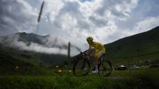 Pogacar wins mountainous 14th stage of Tour de France to extend overall lead