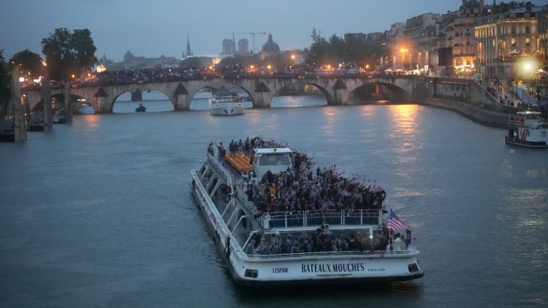 The United States team parades along the Seine river in Paris, France, during the opening ceremony of the 2024 Summer Olympics, Friday, July 26, 2024.. (Luca Bruno/AP Photo)