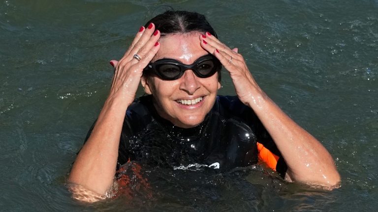 Paris Mayor Anne Hidalgo swims in the Seine river Wednesday, July 17, 2024 in Paris. After months of anticipation, Anne Hidalgo swam in the Seine Rive, fulfilling a promise she made in January nine days before the opening ceremony of the 2024 Olympics. (Michel Euler/AP Photo)