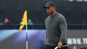 Tiger Woods of the United States walks from the 18th green following his opening round of the British Open Golf Championships at Royal Troon golf club in Troon, Scotland, Thursday, July 18, 2024. (Scott Heppell/AP Photo)