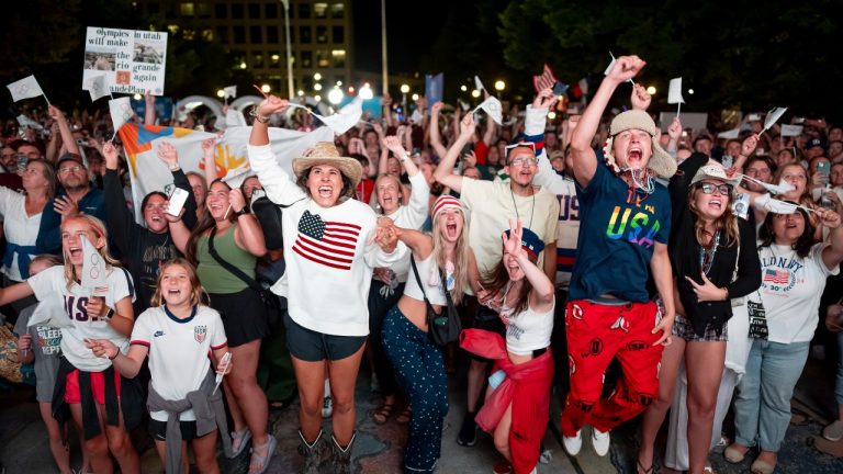 People celebrate while watching a live feed from Paris at the moment the International Olympic Committee awarded Salt Lake City the 2034 Winter Olympics, Wednesday, July 24, 2024, in Salt Lake City. (Spenser Heaps/AP Photo)