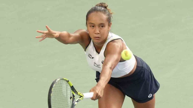 Canada's Leylah Fernandez hits a backhand return to Japan's Nao Hibino at the National Bank Open in Toronto on Wednesday, Aug. 7, 2024. (Chris Young/CP)