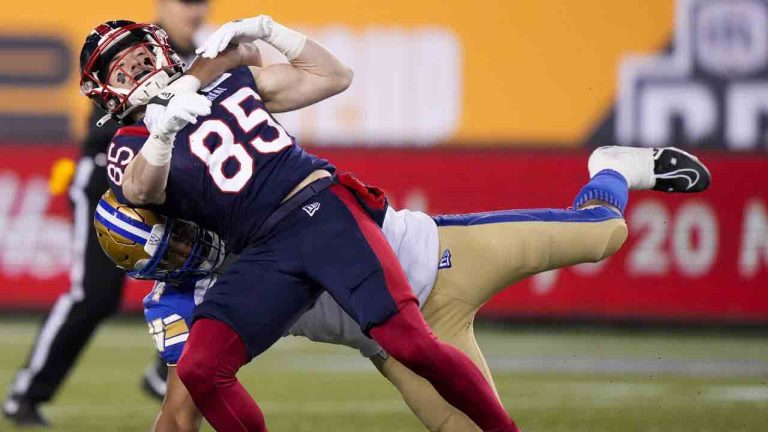 Montreal Alouettes wide receiver Tyler Snead (85) is tackled Winnipeg Blue Bombers defensive end Jackson Jeffcoat (94) during the first half of football action at the 110th CFL Grey Cup in Hamilton, Ont., on Sunday, November 19, 2023. (Frank Gunn
/CP)