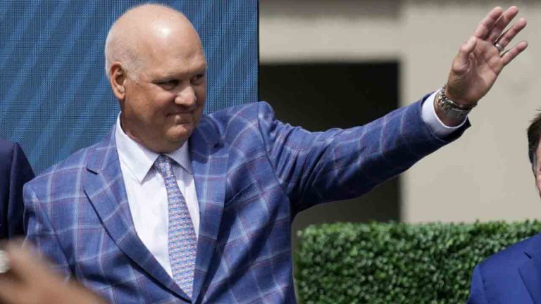 Former Chicago Cubs player Ryne Sandberg waves before the team unveils a statue of him before a baseball game against the New York Mets in Chicago, June 23, 2024. (Nam Y. Huh/AP)