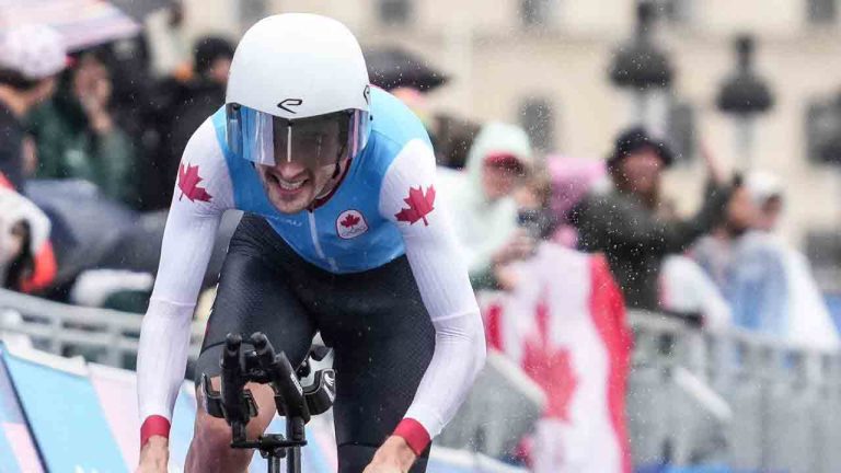 Derek Gee of Canada competes in the Men's Individual Time Trial cycling event in Paris, France on Saturday, July 27, 2024. The 27-year-old cyclist from Ottawa surprised “everyone” — including himself — by finishing third at the Criterium du Dauphine in June and ninth overall at the Tour de France in July. (Christinne Muschi/CP)