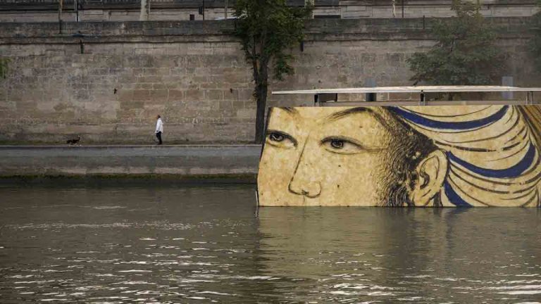 Reproductions of artworks decorate the banks of the River Seine at the 2024 Summer Olympics, Tuesday, July 30, 2024, in Paris, France. (Dar Yasin/AP)