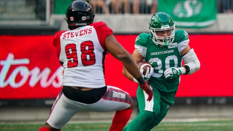 Saskatchewan Roughriders kick returner Thomas Bertrand-Hudon (30) runs the football during the second half of CFL football action in Regina on Sunday, August 6, 2023. (Heywood Yu/CP)