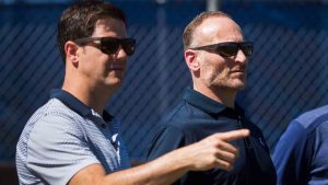 Toronto Blue Jays general manager Ross Atkins, left, talks with Blue Jays President Mark Shapiro, right, during baseball spring training in Dunedin, Fla., on Friday, February 24, 2017. (Nathan Denette/CP)