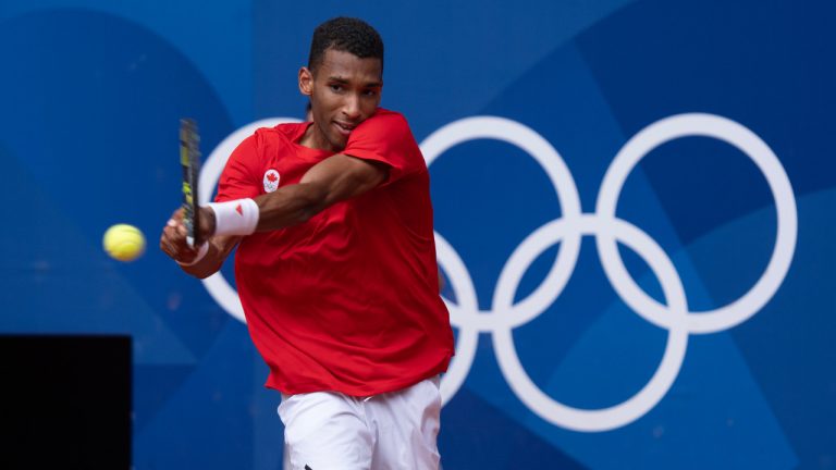 Félix Auger-Aliassime plays against Spain's Carlos Alcaraz during a men's tennis semifinal at the Summer Olympics, Friday, August 2, 2024 in Paris. (Adrian Wyld/CP)