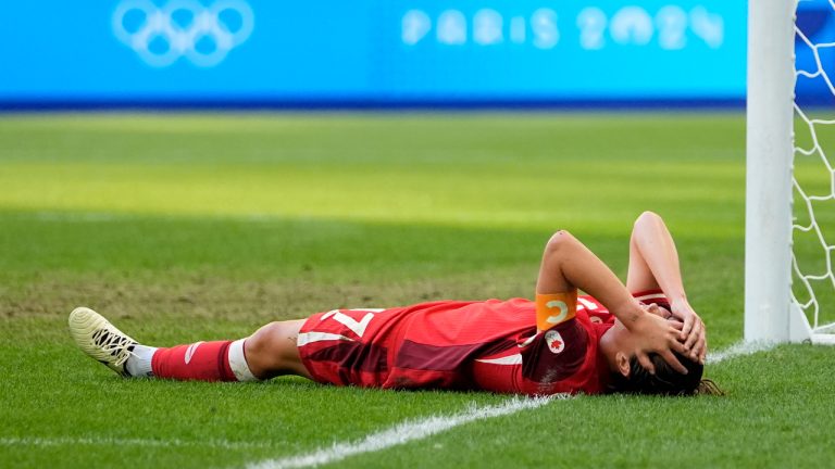 Canada's Jessie Fleming reacts on the ground during a women's quarterfinal soccer match between Canada and Germany at the 2024 Summer Olympics, Saturday, Aug. 3, 2024, at Marseille Stadium in Marseille, France. (Julio Cortez/AP) 