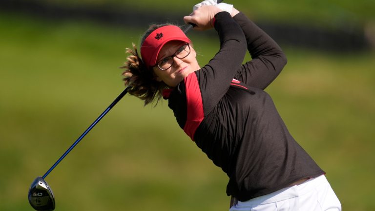 Brooke Henderson, of Canada, plays off the 3rd tee during the first round of the women's golf event at the 2024 Summer Olympics, Wednesday, Aug. 7, 2024, at Le Golf National in Saint-Quentin-en-Yvelines, France. (George Walker IV/AP) 