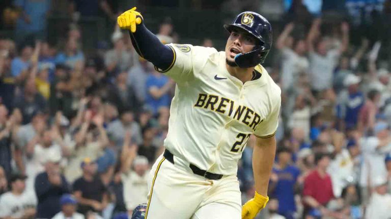 Milwaukee Brewers' Willy Adames (27) reacts to driving in the go ahead run during the eighth inning of a baseball game against the Los Angeles Dodgers, Thursday, Aug. 15, 2024, in Milwaukee. (Kayla Wolf/AP)