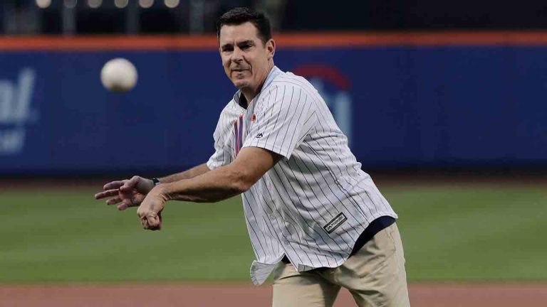 Former Major League Baseball player Billy Bean throws out the first pitch before the start of a baseball game between the New York Mets and the San Diego Padres, Saturday, Aug. 13, 2016, in New York. Bean threw out the pitch on the first Mets Pride Night. (Julie Jacobson/AP)