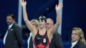 Canada's Summer McIntosh, of Toronto, celebrates her win and new Olympic record in the 200m women's butterfly final during the 2024 Summer Olympic Games, in Paris, Thursday, Aug. 1, 2024. (Christinne Muschi/CP)