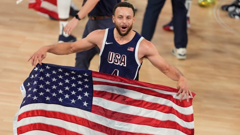 United States' Stephen Curry (4) reacts after winning a men's gold medal basketball game against France. (Michael Conroy/AP)