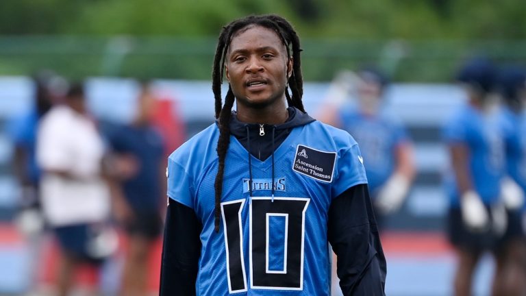 Tennessee Titans wide receiver DeAndre Hopkins (10) walks off the field after an NFL training camp practice Thursday, July, 25, 2024. (AP Photo/Mark Zaleski)