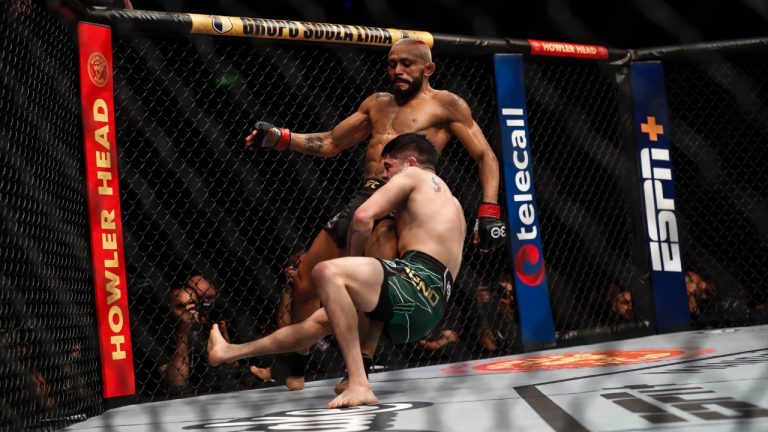 Brandon Moreno, bottom, competes with Brazil's Deiveson Figueiredo, in a flyweight title bout at UFC 283. (Bruna Prado/AP)