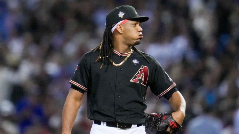 Arizona Diamondbacks relief pitcher Luis Frias reacts during the third inning in Game 4 of the baseball World Series against the Texas Rangers. (Godofredo A. Vásquez/AP)