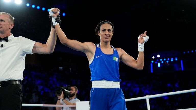 Algeria's Imane Khelif celebrates after defeating Thailand's Janjaem Suwannapheng in their women's 66 kg semifinal boxing match at the 2024 Summer Olympics, Tuesday, Aug. 6, 2024, in Paris, France. (John Locher/AP)