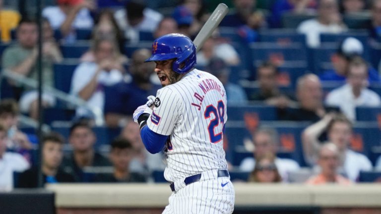 New York Mets' J.D. Martinez reacts after being hit by a pitch during the third inning of a baseball game against the Oakland Athletics, Tuesday, Aug. 13, 2024, in New York. (Julia Nikhinson/AP)