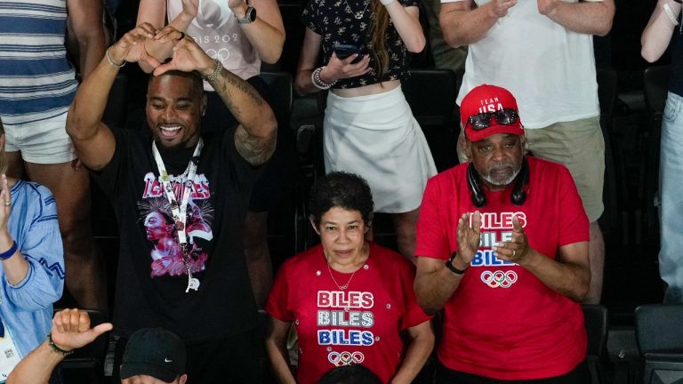 U.S. gymnast Simone Biles' husband Jonathan Owens, and her parents Ron and Nellie Biles cheer afger she won the women's artistic gymnastics all-around finals in Bercy Arena at the 2024 Summer Olympics, Thursday, Aug. 1, 2024, in Paris, France. (AP/Morry Gash)