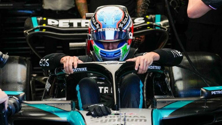 Mercedes driver Andrea Kimi Antonelli of Italy enters his car during the first free practice ahead of the Formula One Italian Grand Prix race at the Monza racetrack, in Monza, Italy, Friday, Aug. 30, 2024. (AP/Luca Bruno)