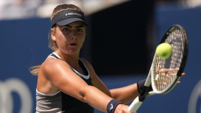 Canada's Marina Stakusic hits a return to Erika Andreeva, of Russia, at the National Bank Open in Toronto on Wednesday, Aug. 7, 2024. (Chris Young/CP)