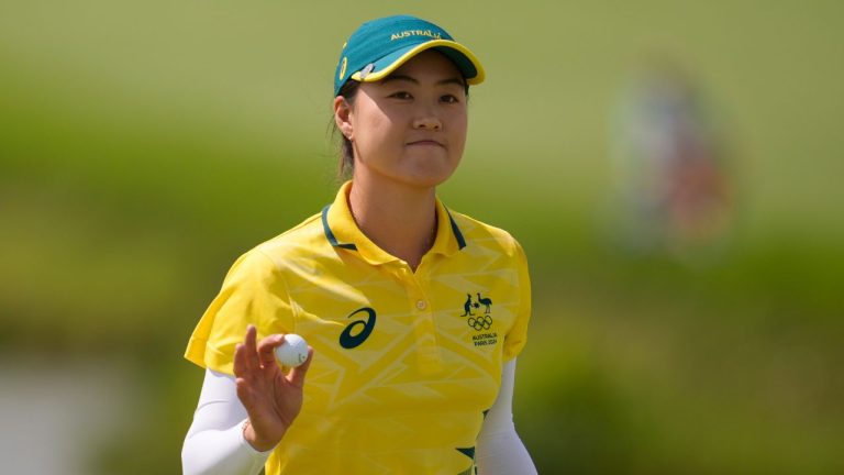 Minjee Lee, of Australia, acknowledges the crowd after putting on the 10th green during the first round of the women's golf event at the 2024 Summer Olympics, Wednesday, Aug. 7, 2024, at Le Golf National, in Saint-Quentin-en-Yvelines, France. (George Walker IV/AP Photo)