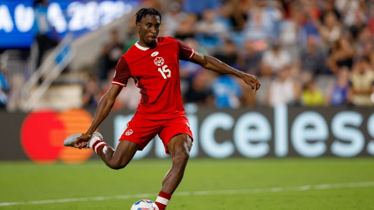 Canada defender Moïse Bombito shoots in a penalty shootout the Copa America third place soccer match against Uruguay in Charlotte, N.C., Saturday, July 13, 2024. (AP/Nell Redmond)