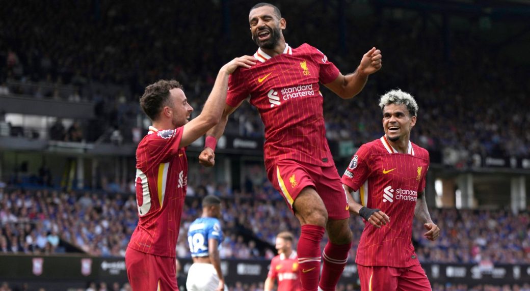 Liverpool’s new era under Slot begins with win at Ipswich and scoring record for Salah