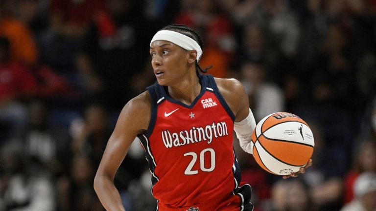 Washington Mystics guard Brittney Sykes (20) brings the ball up court during the second half of a WNBA basketball game against the New York Liberty, Tuesday, May 14, 2024, in Washington. (Terrance Williams/AP Photo)