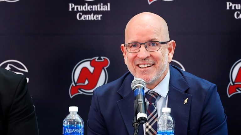 New Jersey Devils general manager Tom Fitzgerald smiles during an NHL press conference, May 28, 2024. (AP Photo/Noah K. Murray)