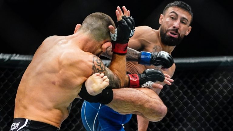 Chris Gutierrez kicks Frankie Edgar at UFC 281. Gutierrez stopped Edgar in the first round. (Frank Franklin II/AP)