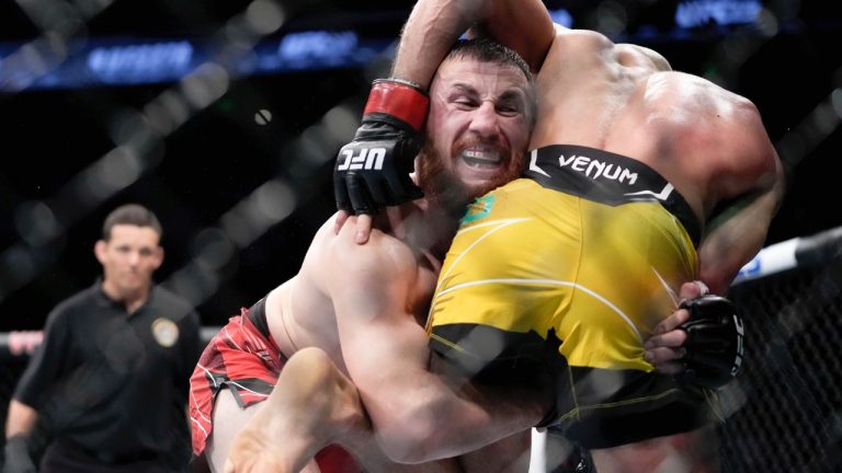 UFC bantamweight fighter Merab Dvalishvili of Georgia goes for a takedown during a mixed martial arts bout. (Francisco Kjolseth/The Salt Lake Tribune via AP)