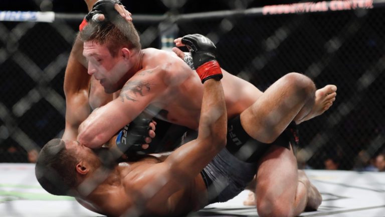 Gerald Meerschaert, right, delivers an elbow to Trevin Giles during the second round of a middleweight mixed martial arts bout at a UFC Fight Night event. (Frank Franklin II/AP)