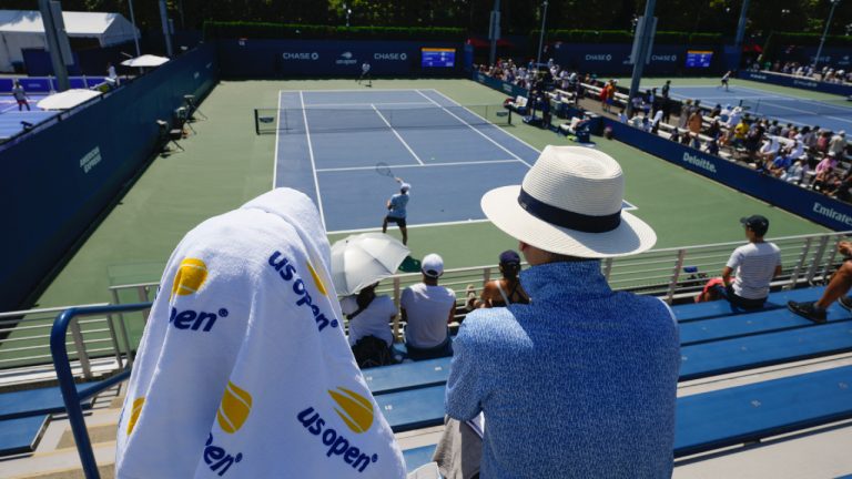 Spectators watch a match during the first round of the U.S. Open tennis championships, Tuesday, Aug. 27, 2024, in New York. (Kirsty Wigglesworth/AP)