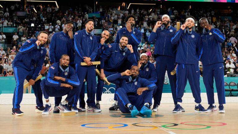 Team USA celebrating after winning the gold medal during a men's gold medal basketball game at Bercy Arena at the 2024 Summer Olympics, Sunday, Aug. 11, 2024, in Paris, France. (Rebecca Blackwell/AP Photo)