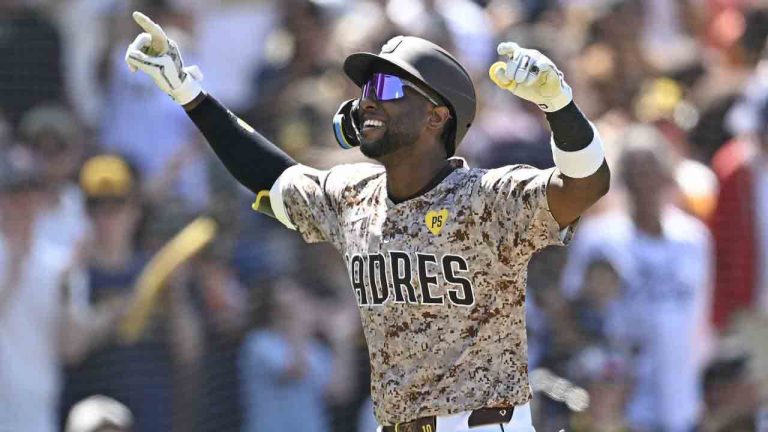 San Diego Padres' Jurickson Profar reacts after hitting a solo home run during the fifth inning of a baseball game against the Colorado Rockies, Sunday, Aug. 4, 2024, in San Diego. (Denis Poroy/AP)