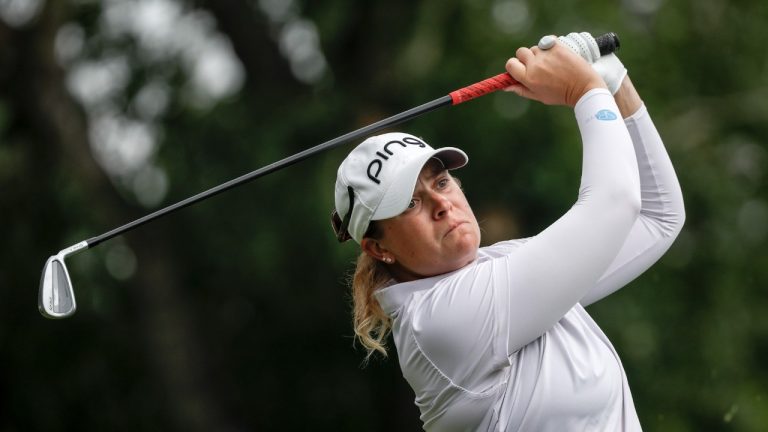 Lauren Coughlin, of the United States, hits a tee shot on the fifth hole during the third round at the LPGA Canadian Women's Open golf tournament in Calgary, Alta., Saturday, July 27, 2024. (Jeff McIntosh/CP)