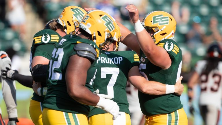 Edmonton Elks celebrate a touchdown against the B.C. Lions during first half CFL action in Edmonton, Sunday, Aug. 11, 2024. (Jason Franson/CP)